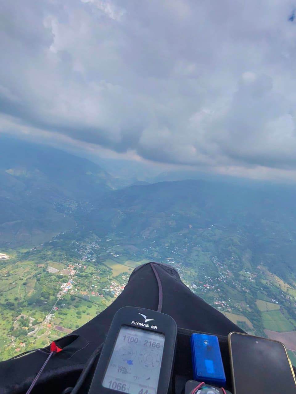 Cockpit view over dramatic Andean cloudscapes